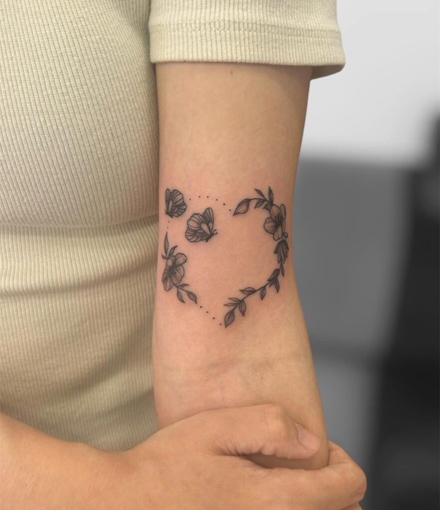 Delicate Floral and Butterfly Heart Upper Arm Tattoo Tattoo Design