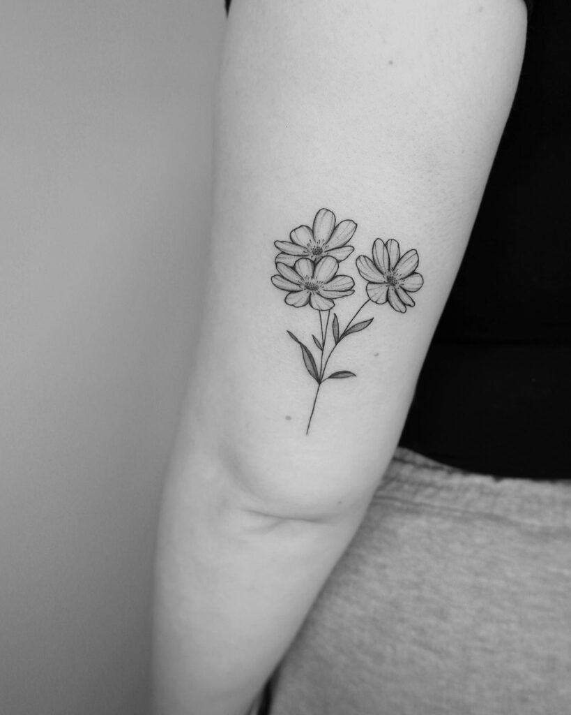Delicate Trio of Wildflowers Upper Arm Tattoo Tattoo Design