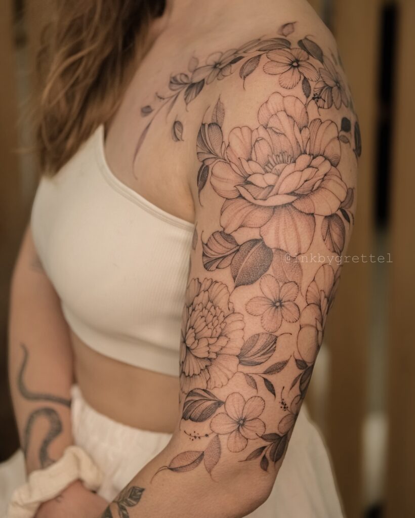 Flowing Peony and Cherry Blossom Upper Arm Tattoo Tattoo Design