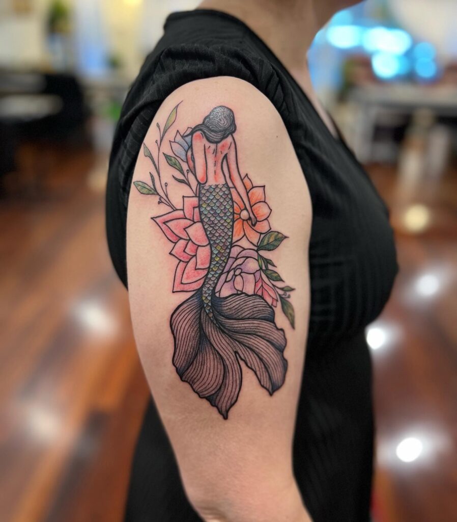 Graceful Mermaid with Florals Upper Arm Tattoo Tattoo Design