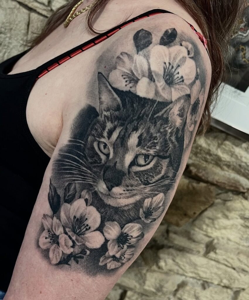 Realistic Cat and Blossoms Upper Arm Tattoo Tattoo Design