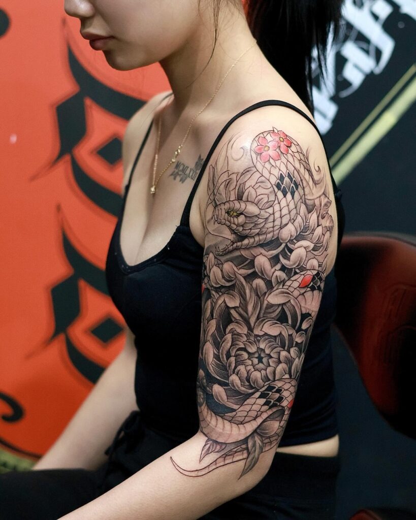 Snake and Chrysanthemum Upper Arm Tattoo Tattoo Design