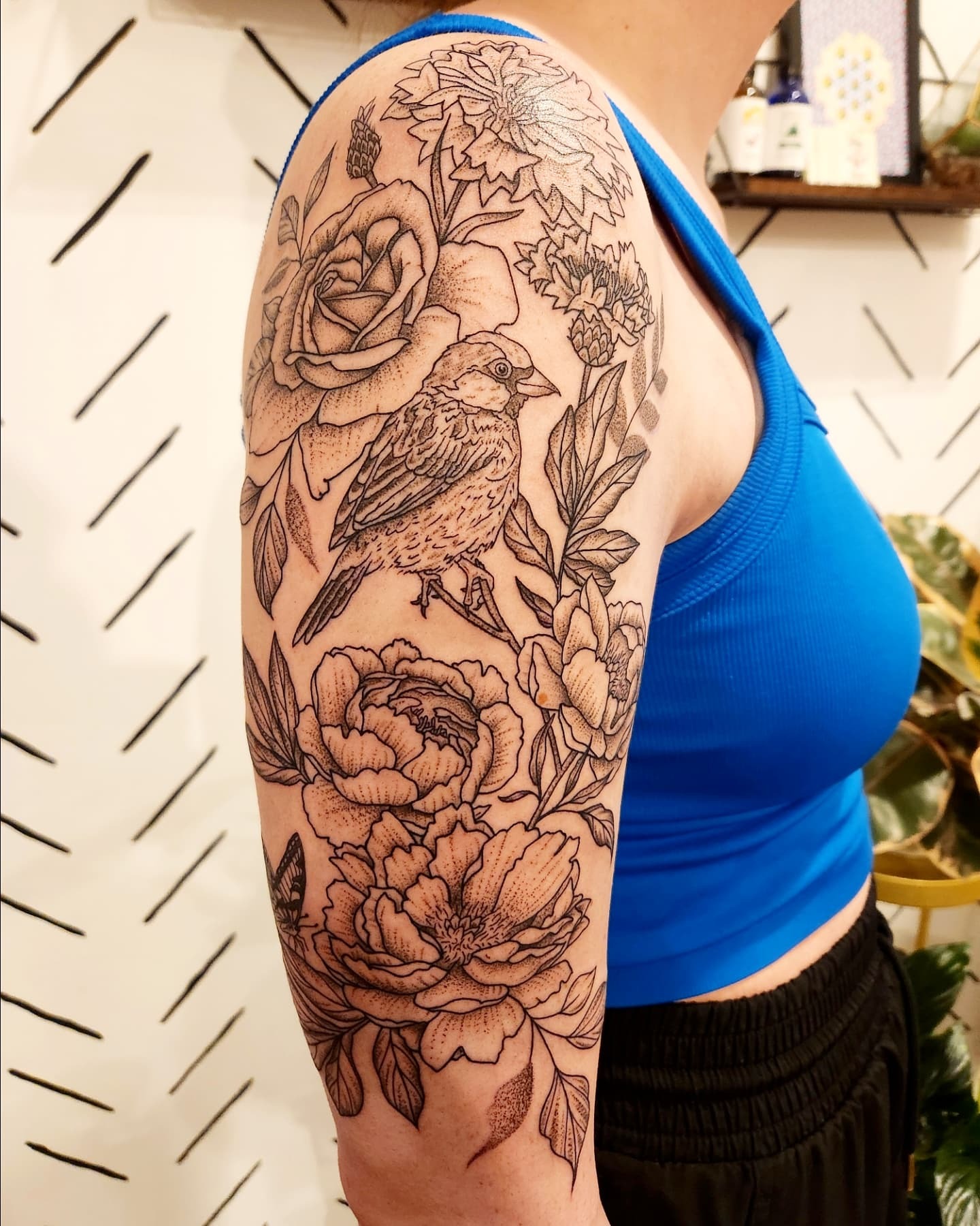 Sparrow and Floral Upper Arm Tattoo Tattoo Design