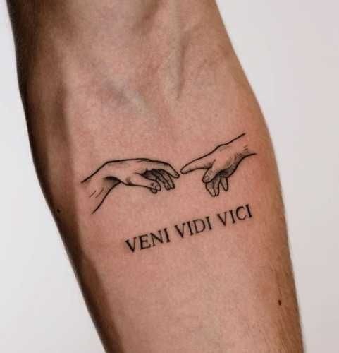 Bold Gothic Script on the Forearm Tattoo Design