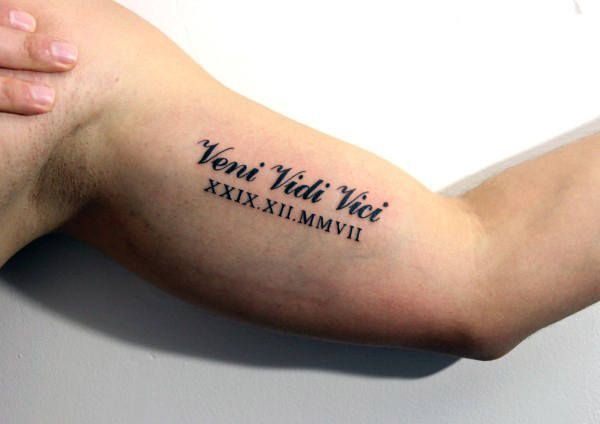 Brazo Tattoo with Roman Numerals Tattoo Design