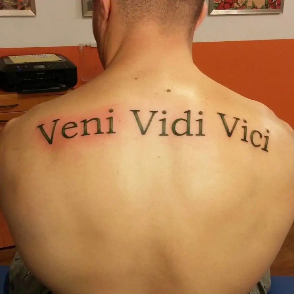 Classic "Veni, Vidi, Vici" Across the Back Tattoo Design