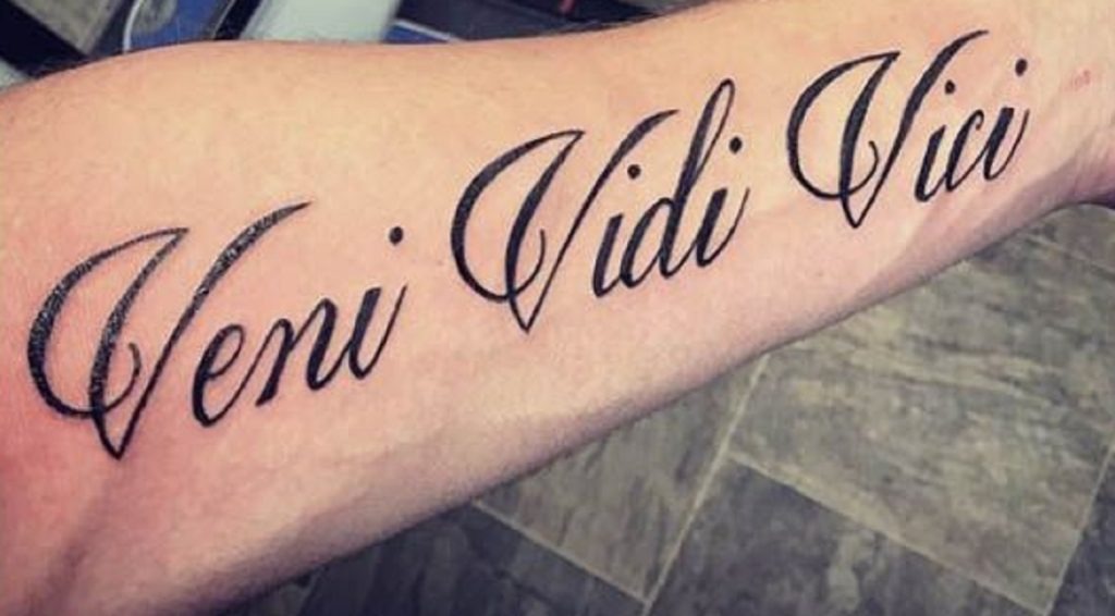 Scripted Forearm Tattoo with Flourishes Tattoo Design