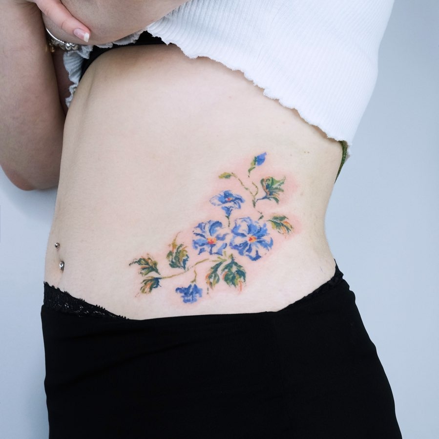 Pastel Blue Floral Waist Tattoo Tattoo Design