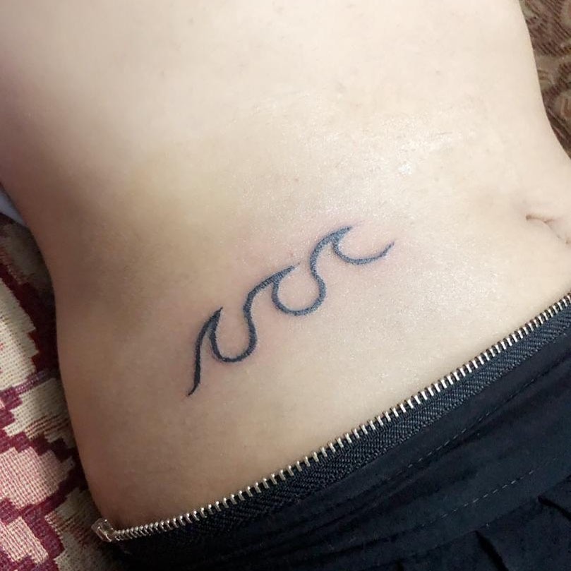 Side Waist Script Tattoo Tattoo Design