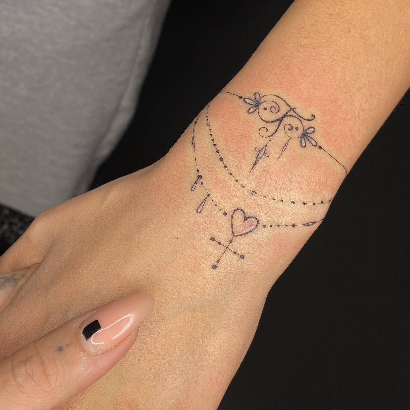 Delicate Heart and Charm Bracelet Tattoo Tattoo Design
