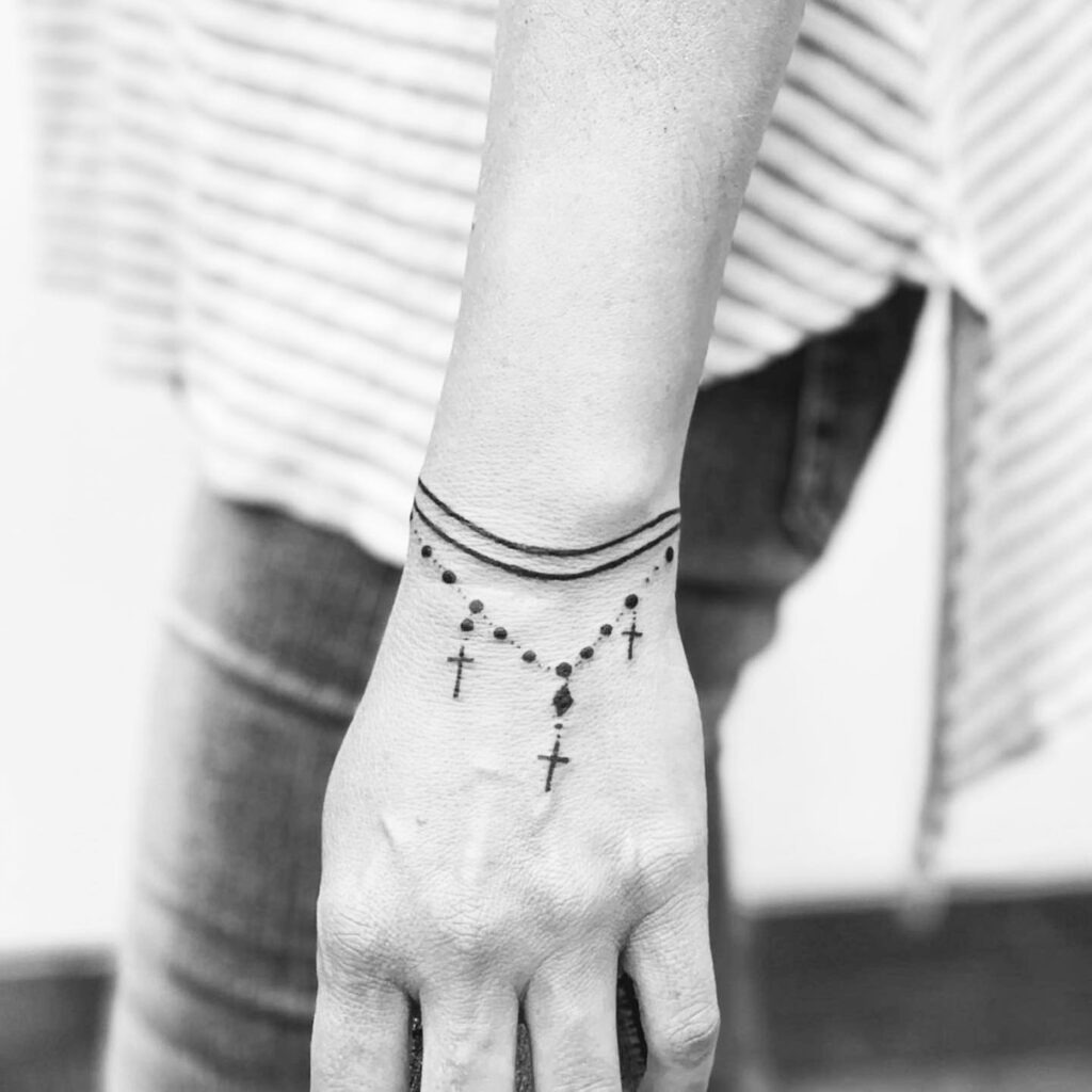 Rosary-Inspired Cross Bracelet Tattoo Tattoo Design