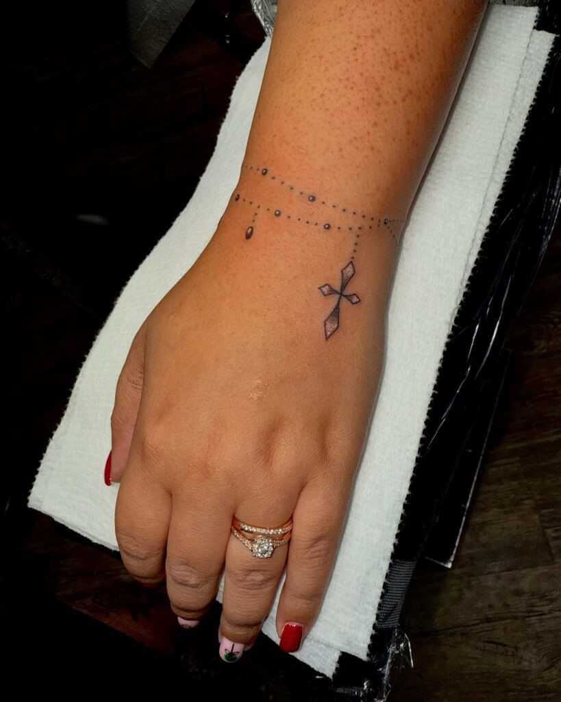 Rosary-Inspired Cross Bracelet Tattoo Tattoo Design