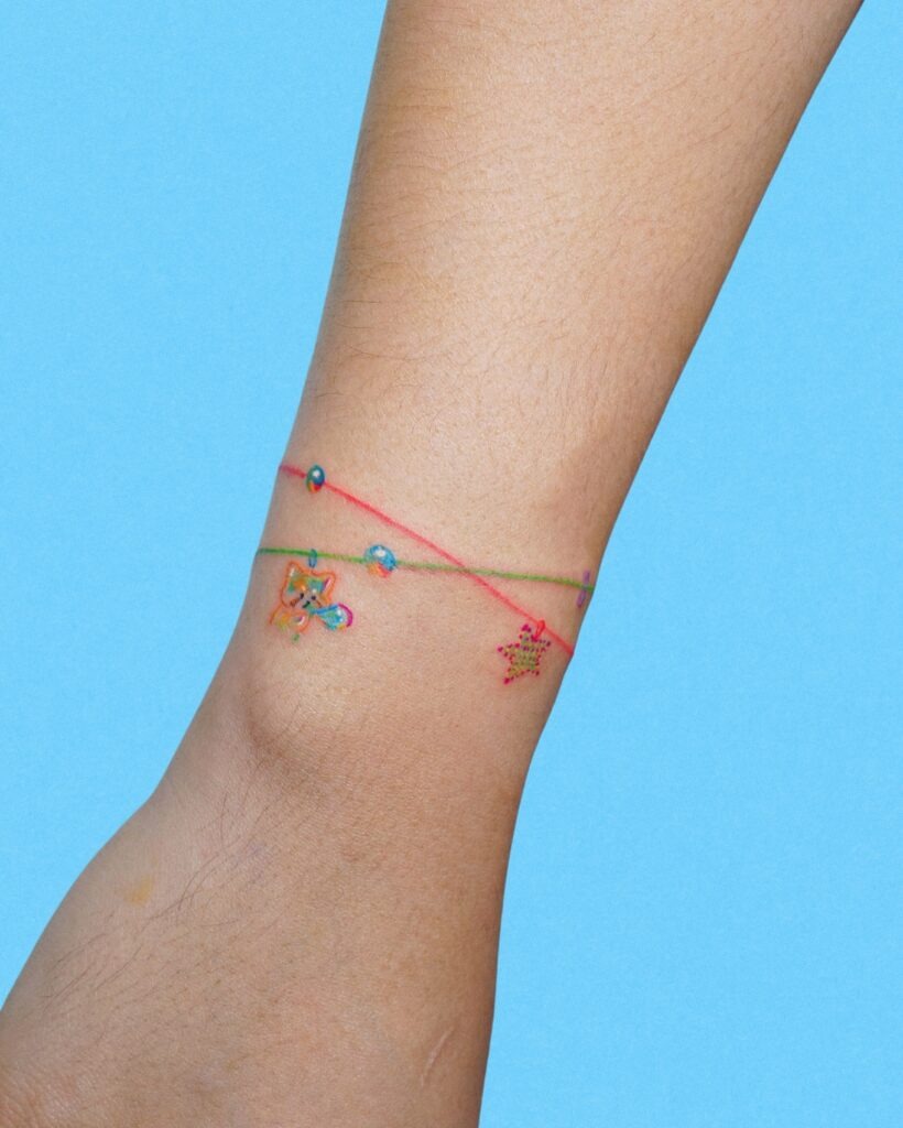 Whimsical Friendship Bracelet Tattoo Tattoo Design