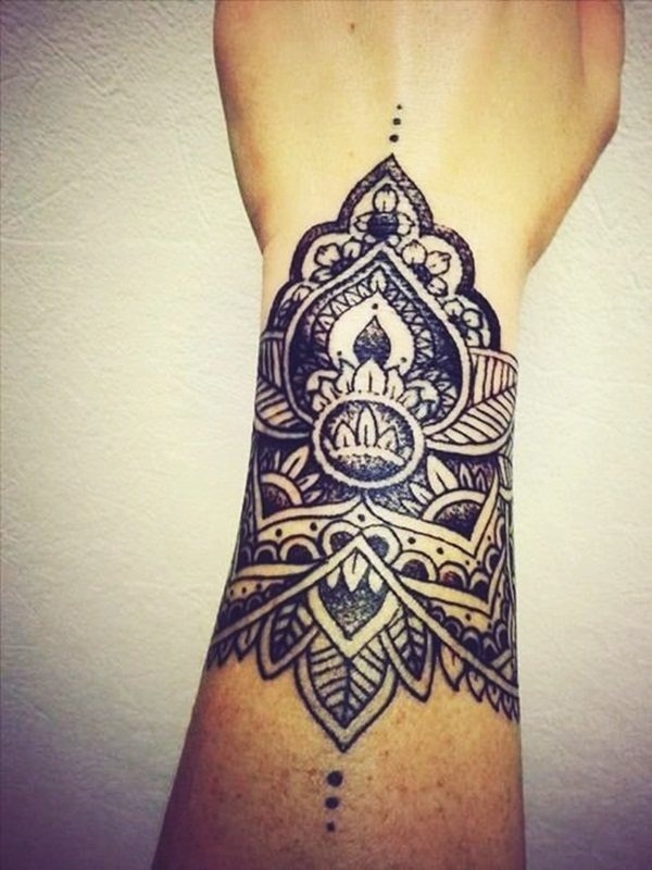 A crown with decorations wrist tattoo Tattoo Design