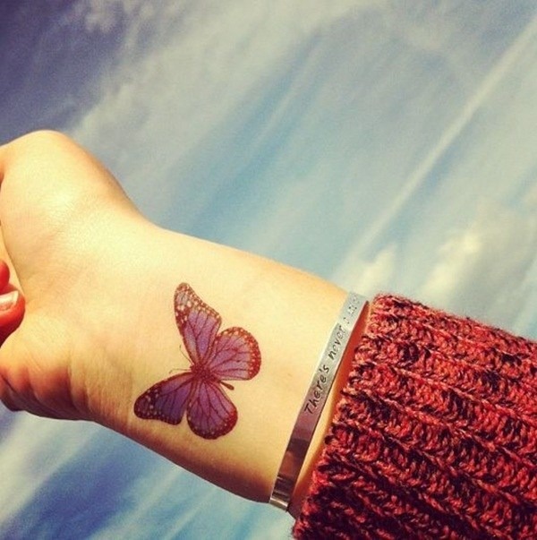 Matching tattoosidea: A beautiful butterfly wrist tattoo Tattoo Design