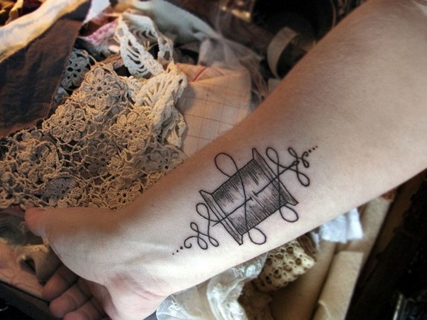 The Needle and Thread Wrist Tattoo Tattoo Design