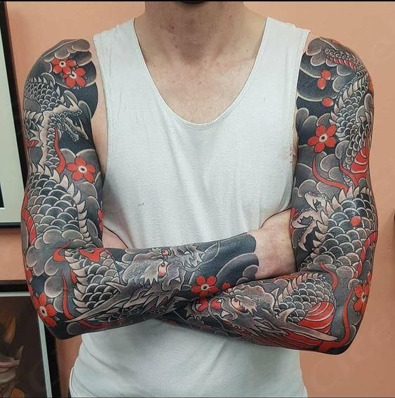 Full Sleeve of Power and Mystery Tattoo Design