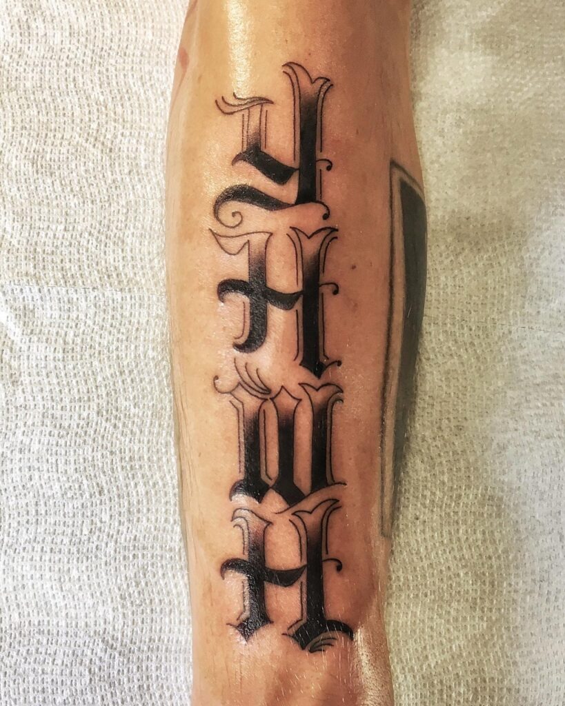 Bold YHWH Forearm Statement Tattoo Design