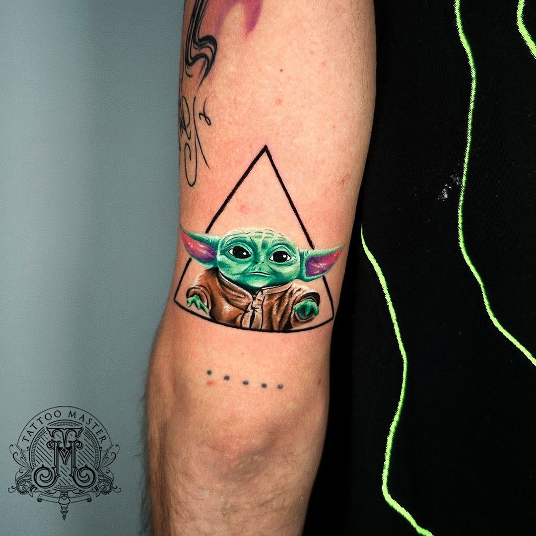 Adorable Grogu Tattoo in Unique Geometric Frame Tattoo Design