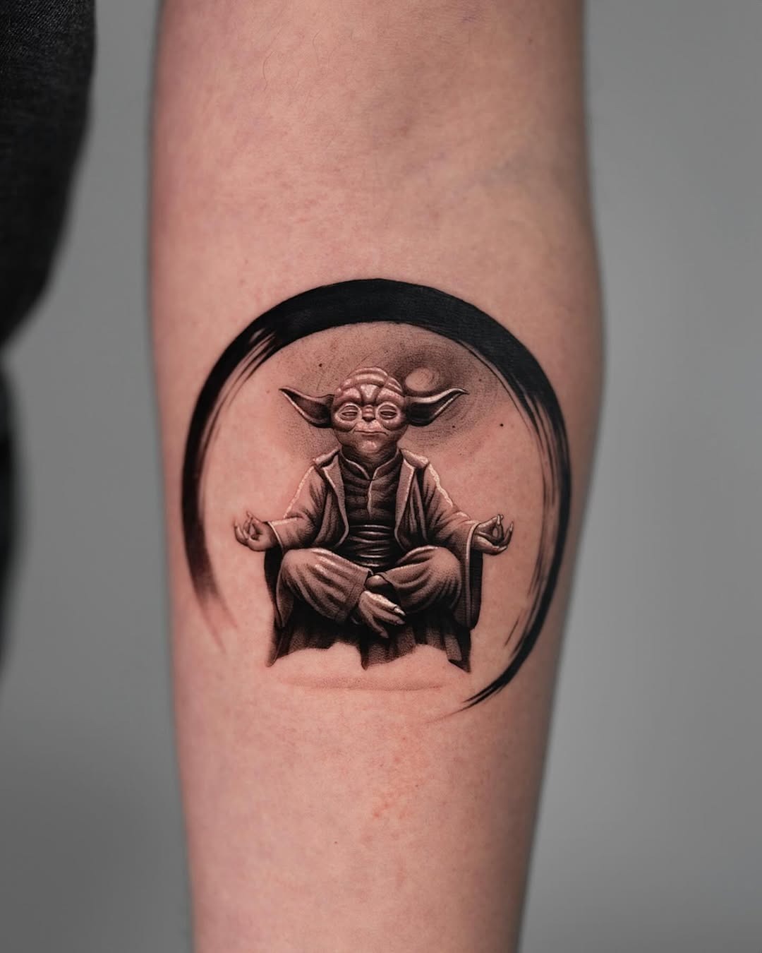 Adorable Yoda tattoo with playful vibe Tattoo Design