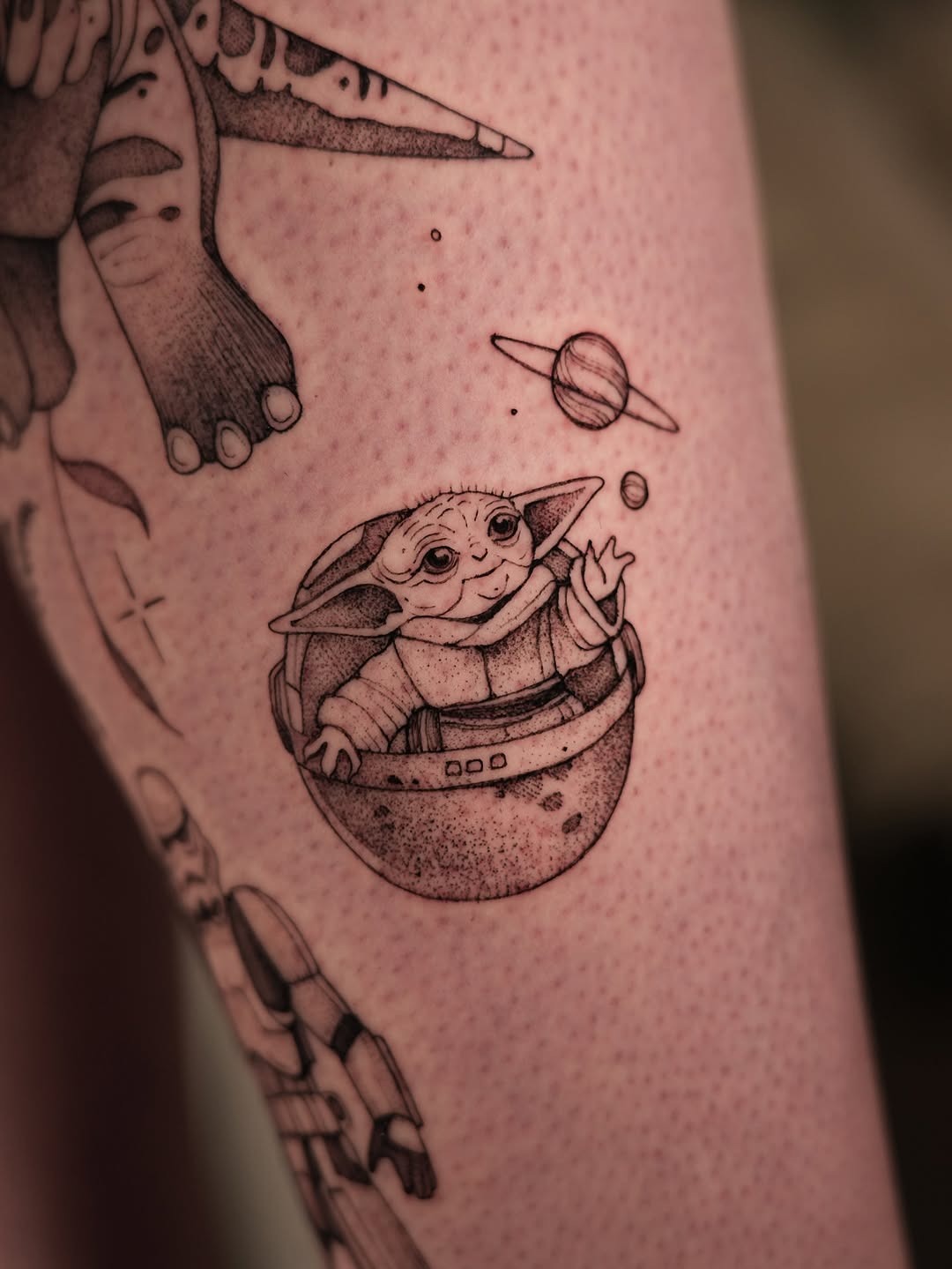 Charming Yoda tattoo in playful space setting Tattoo Design
