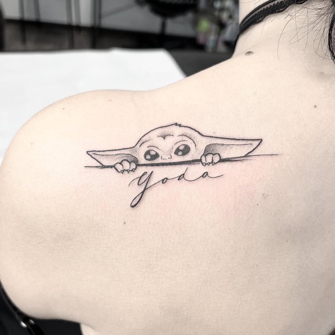 Charming Yoda Tattoo with Childlike Wonder Tattoo Design