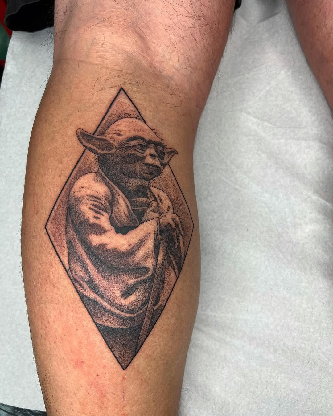 Stunning Yoda Tattoo in Geometric Design Tattoo Design