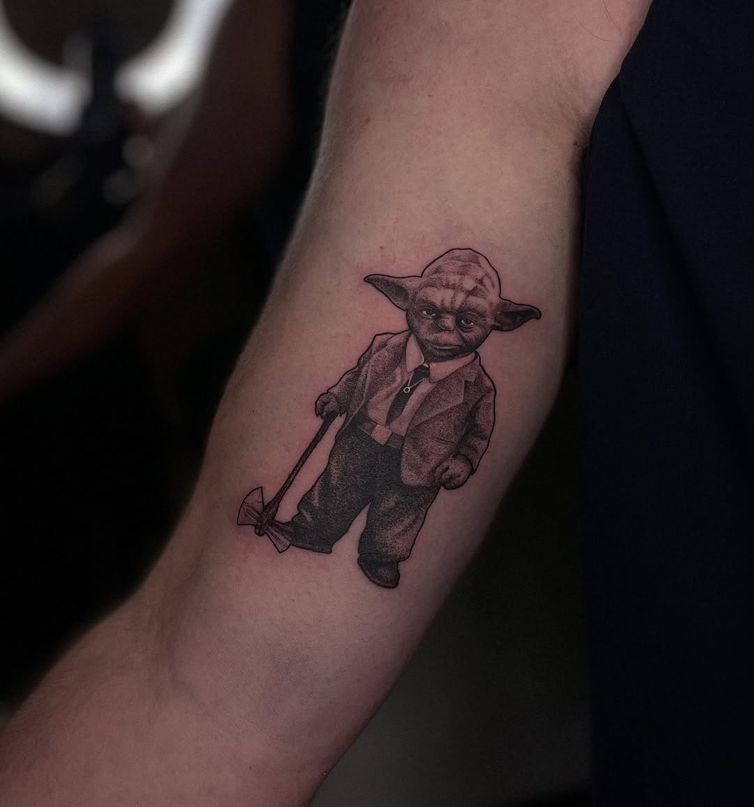 Whimsical Yoda Tattoo in a Suit Tattoo Design