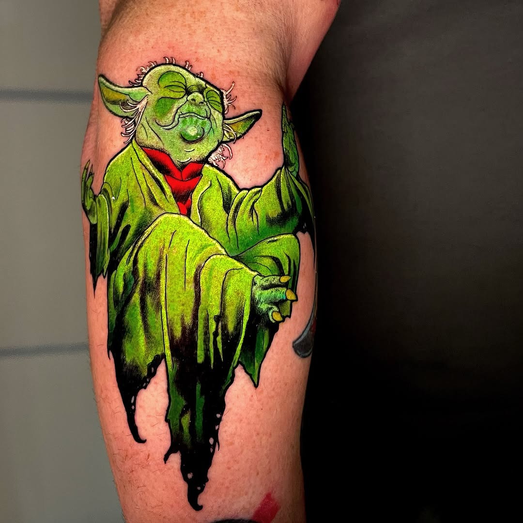 Whimsical Yoda Tattoo in Vibrant Green Tattoo Design