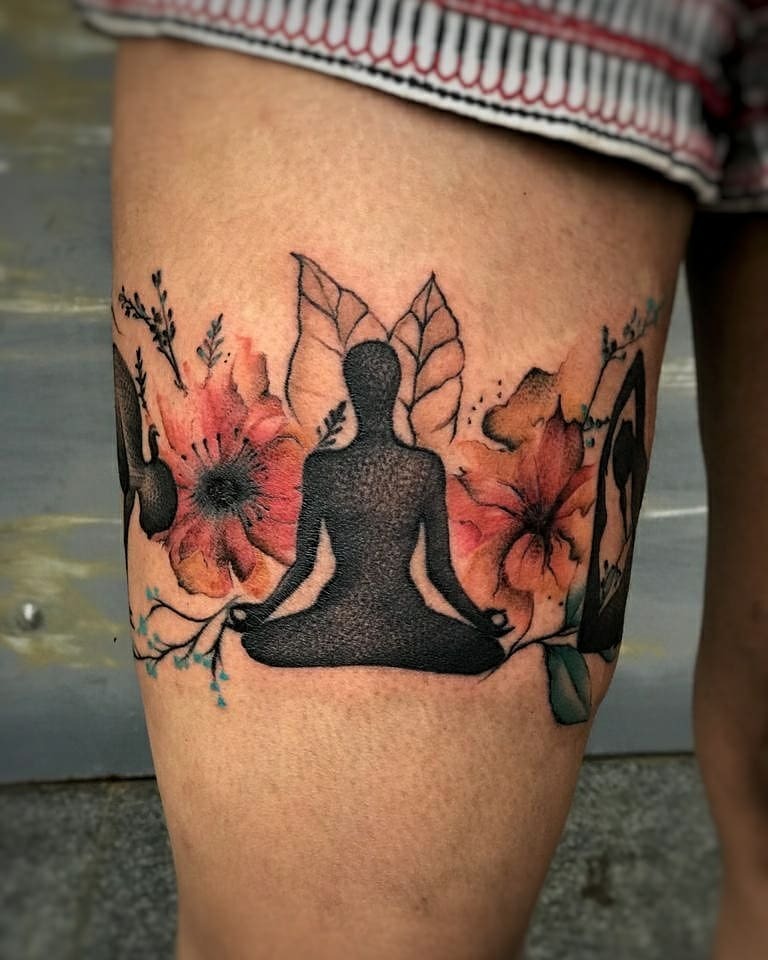 Beautiful yoga silhouette surrounded by floral elements Tattoo Design