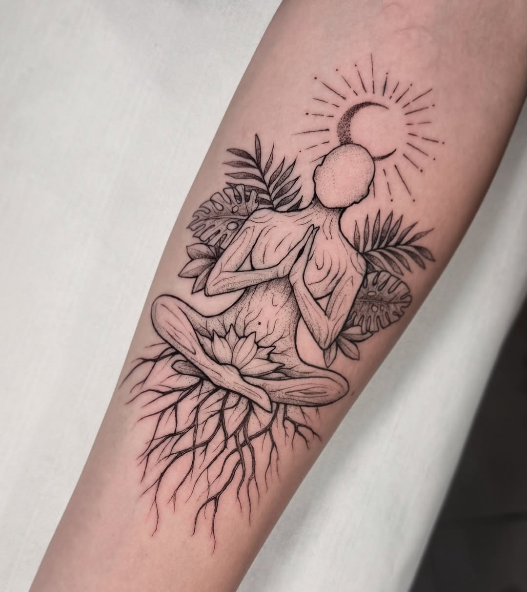Elegant geometric yoga tattoo with meditative elements Tattoo Design