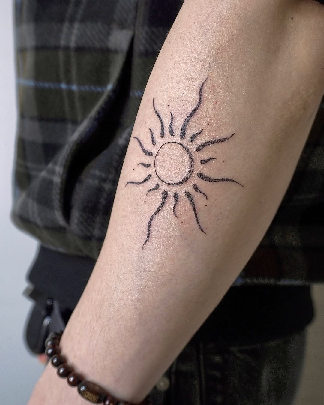 Radiant sun tattoo for yoga enthusiasts Tattoo Design