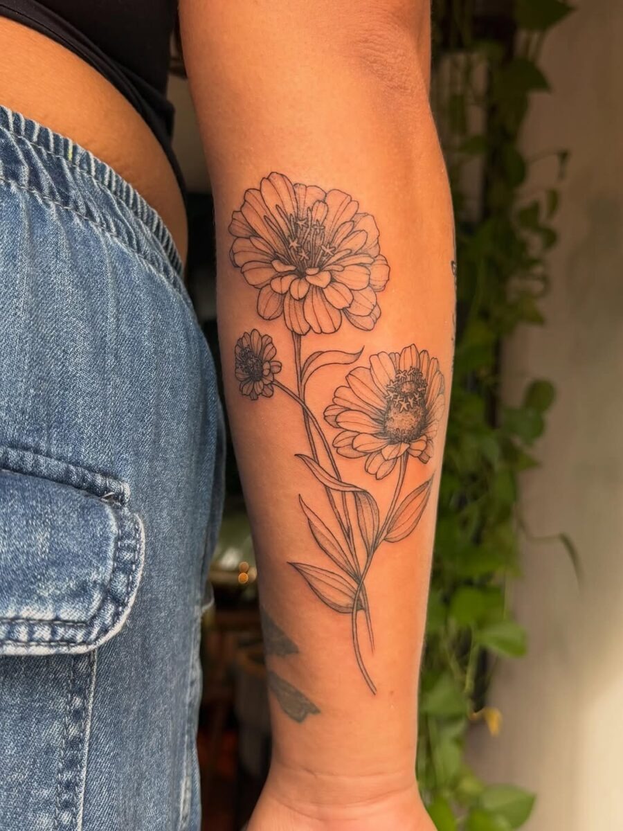 Elegant black ink zinnia flower tattoos Tattoo Design