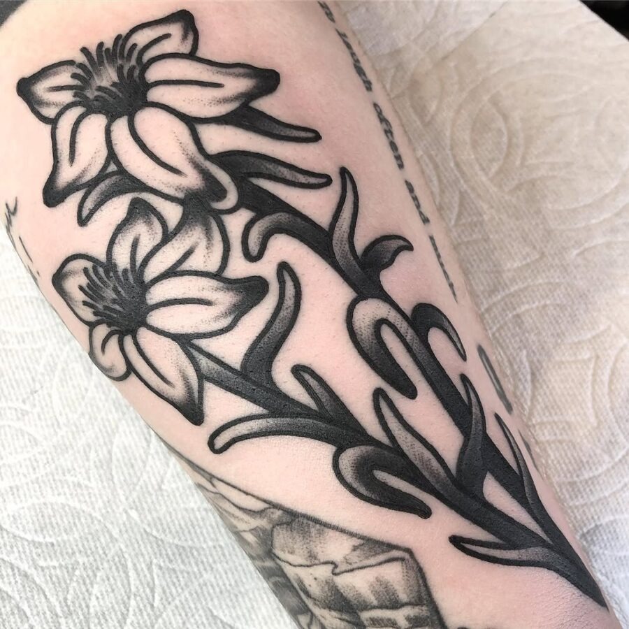 Elegant blackwork zinnia tattoo design Tattoo Design