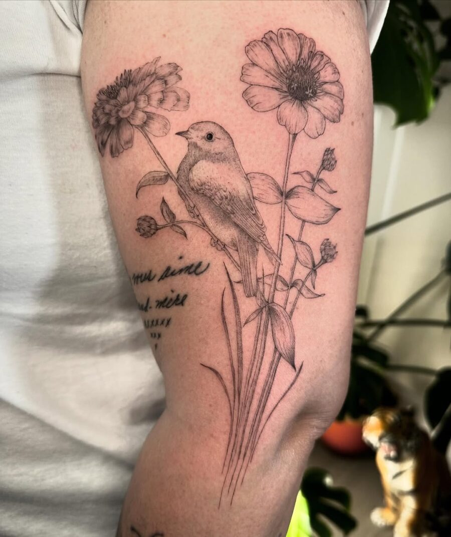 Elegant zinnia and bird tattoo design Tattoo Design