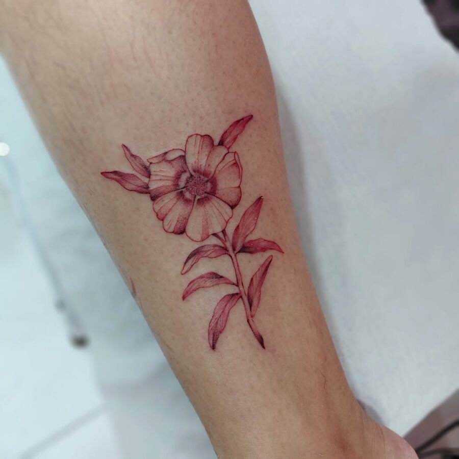 Stunning zinnia tattoo in vibrant red hues Tattoo Design